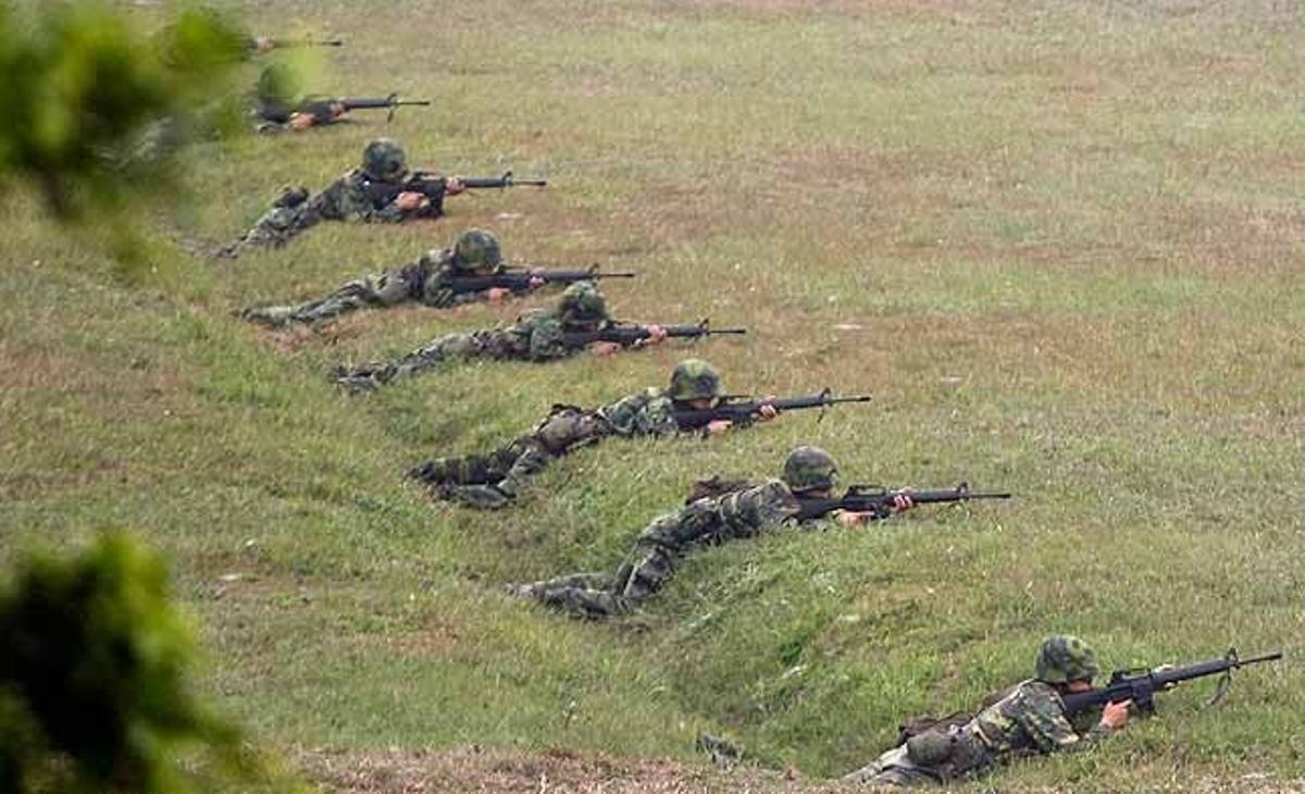 Soldats taiwanesos prenen part d’un entrenament antiaeri com a part de l’exercici militar anual de cinc dies de durada, a la base de Taichung (Taiwan).