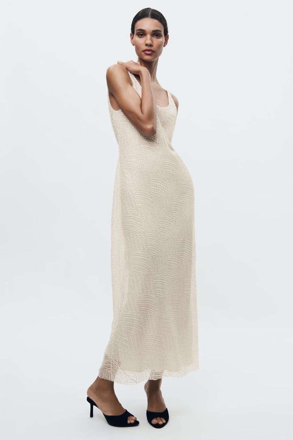 Vestido fluido con detalle de lentejuelas