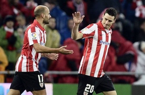 Athletic Bilbao's Aritz Aduriz celebrates his goal with teammate Mikel Rico during their Spanish King's Cup match against Atletico Madrid at San Mames stadium in Bilbao