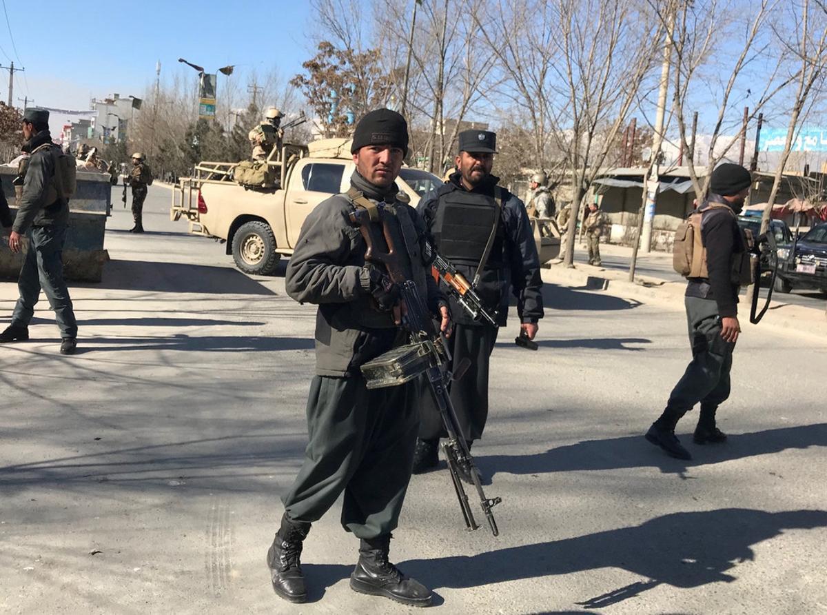 Afghan policemen stand guard at the site of a blast in Kabul, Afghanistan December 28, 2017. Reuters/Mohammad Ismail