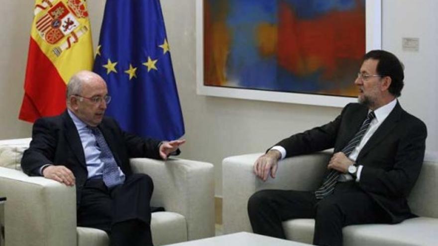 Rajoy se reúne con Almunia