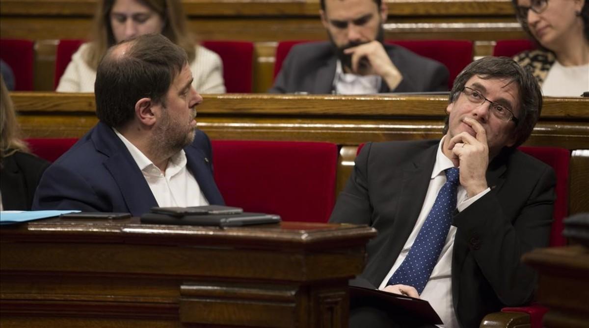 Junqueras y Puigdemont, en el Parlament.