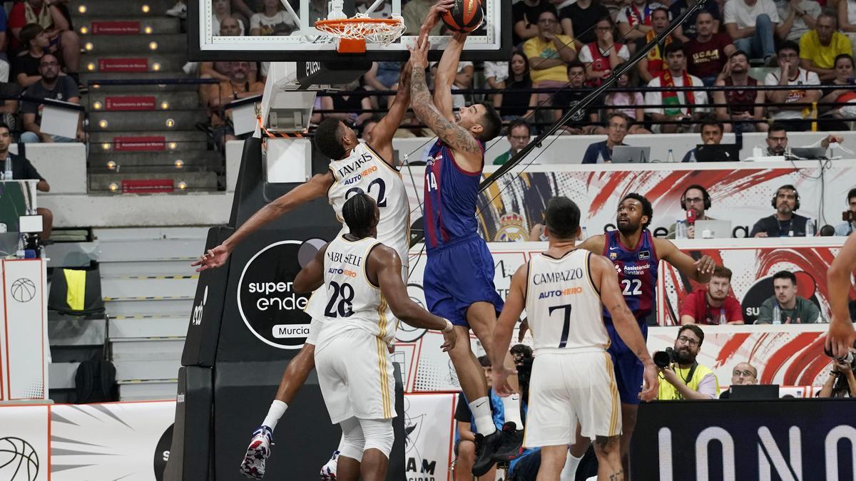 Tavares y Willy Hernangómez, dos de los protagonistas de la nueva temporada de la Euroliga, en la pasada Supercopa