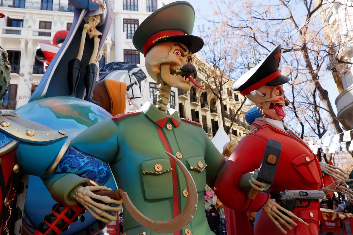 Ninots or giant figures, satirizing wars, are displayed in the streets before being burned during the traditional annual Fallas festival, in Valencia, Spain, March 15, 2024. REUTERS/Eva Manez