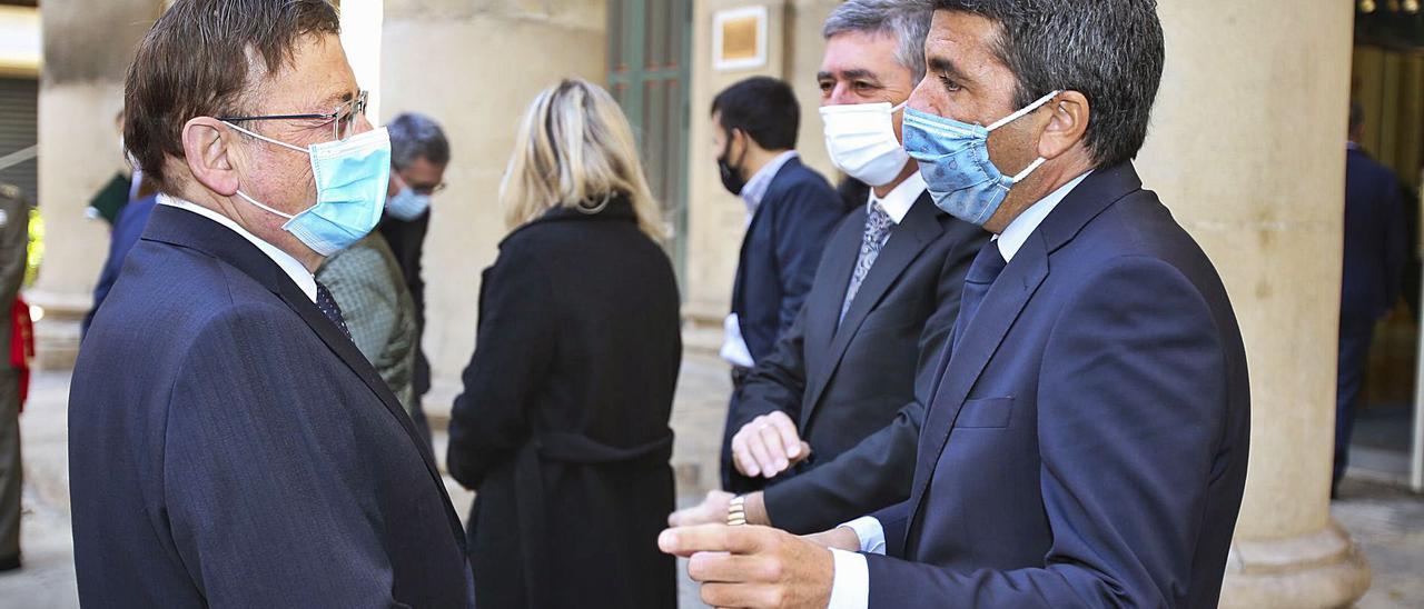 El presidente de la Generalitat, Ximo Puig, y el presidente de la Diputación de Alicante, Carlos Mazón, en un acto en Alicante.