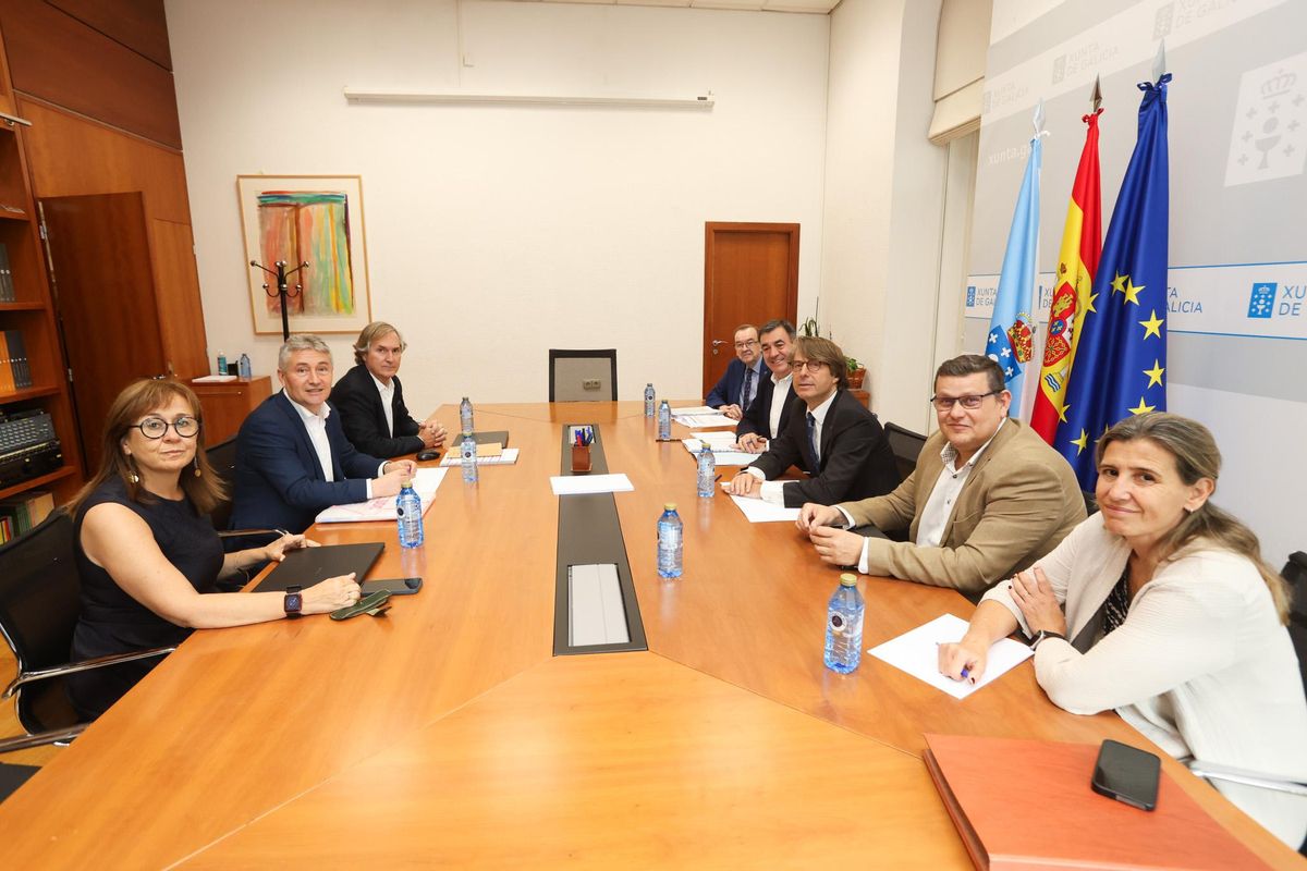 Reunion del rector de a Coruña Ricardo Cao con los conselleiros Miguel  Corgos y Román Rodríguez para analizar la situacion economica de la universidad coruñesa.