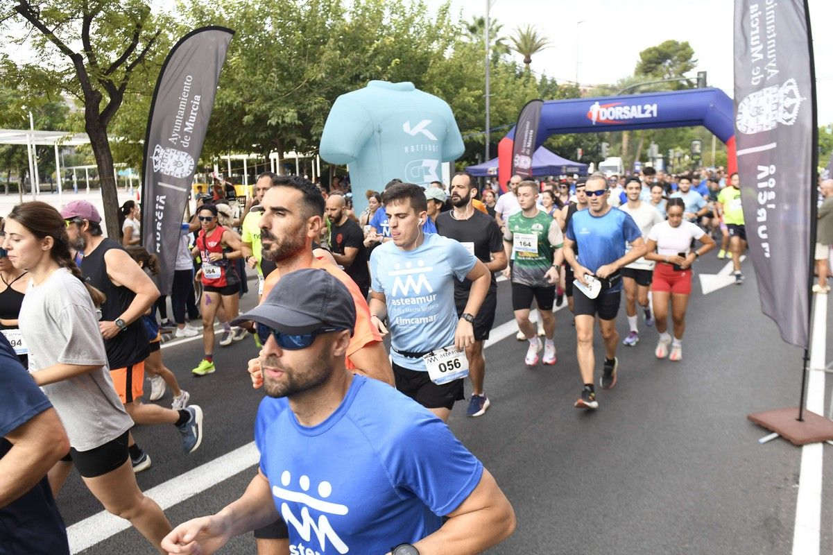 La carrera y marcha Solidaria Asteamur, en imágenes