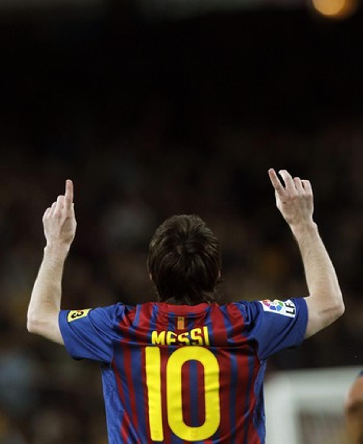 El delantero azulgrana Leo Messi celebra su segundo gol de la noche contra el Espanyol en el Camp Nou.