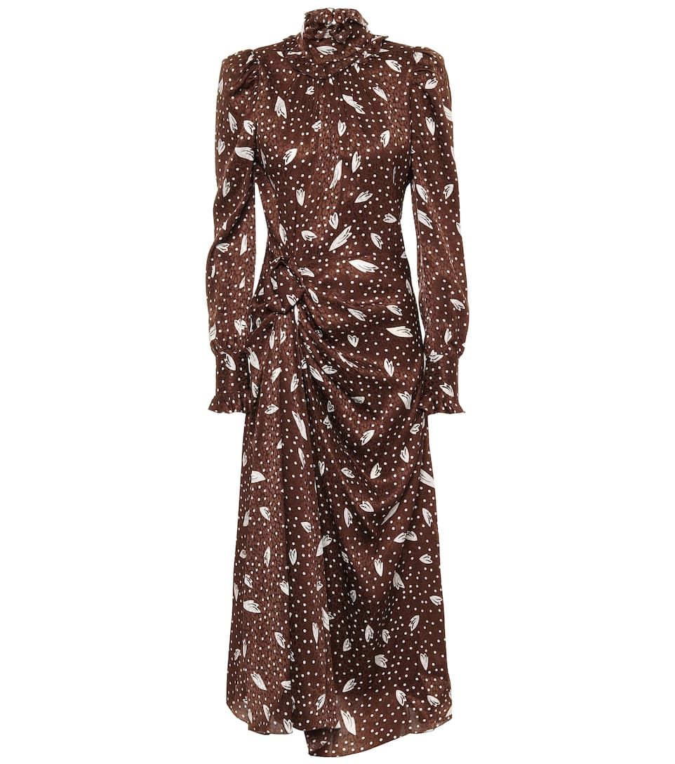 Vestido de aire romántico, en color marrón y estampado, de Alessandra Rich que ha llevado Sienna Miller en la boda de Ellie Goulding