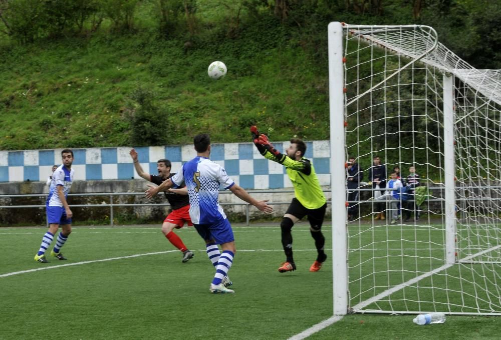 El partido entre el Tuilla y el Langreo, en imágenes