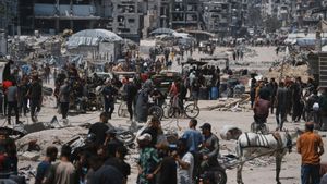 Displaced Palestinians return to retrieve their belongings from their homes in the area where the Israeli army operated in the northern Gaza Strip on Wednesday, June 4, 2025. (AP Photo/Jehad Alshrafi)