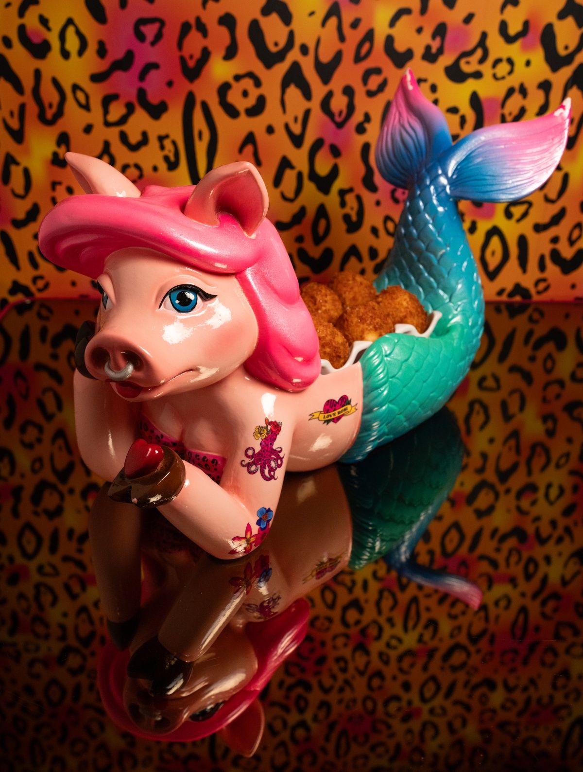 Las croquetas llegarán servidas en esta cerdita sirena.