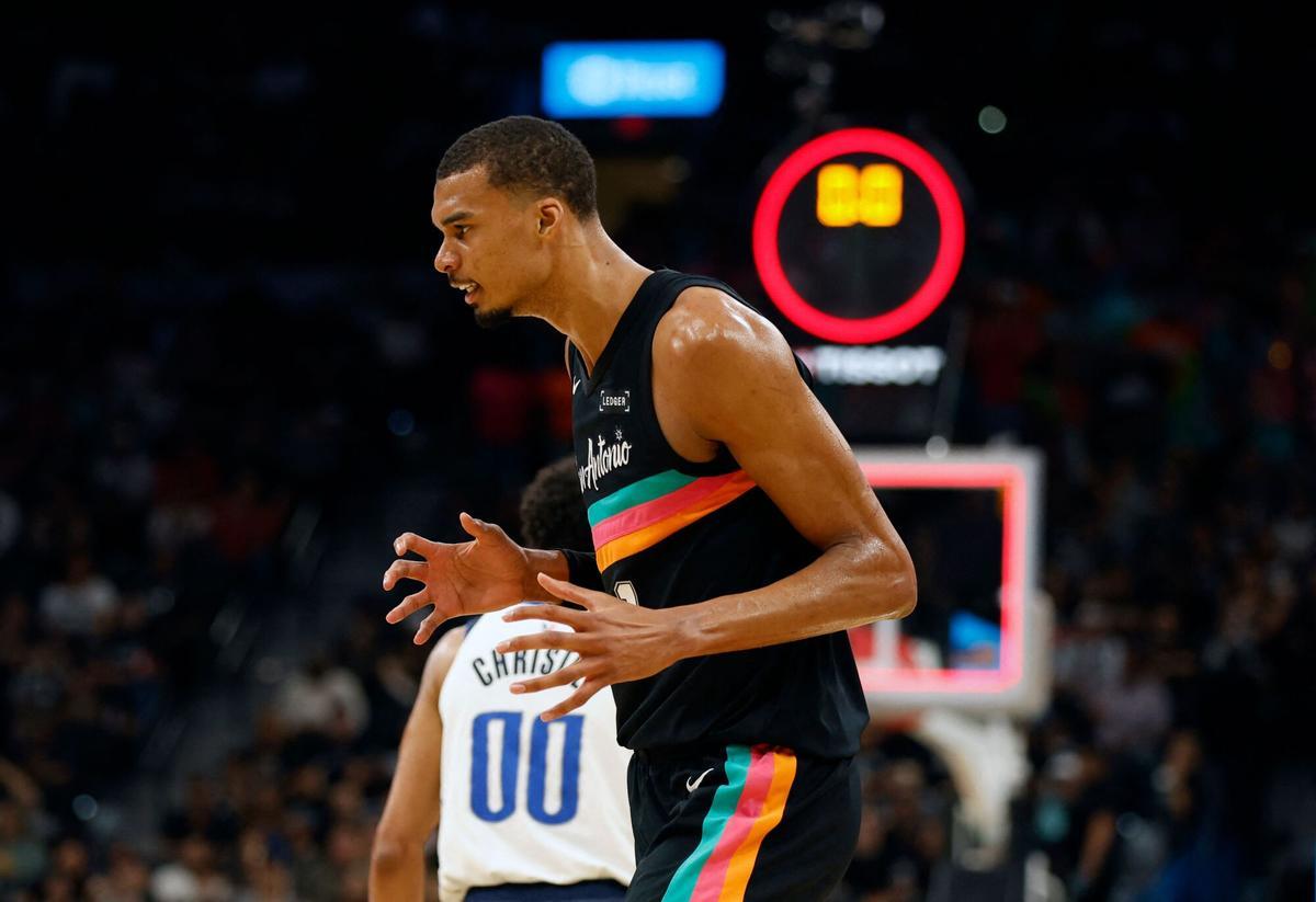 SAN ANTONIO, TX -APRIL 10: Victor Wembanyama shows his frustration after missing a shot against the Dallas Mavericks in the second half at Frost Bank Center on April 10, 2026 in San Antonio, Texas. NOTE TO USER: User expressly acknowledges and agrees that, by downloading and or using this photograph, User is consenting to terms and conditions of the Getty Images License Agreement. Ronald Cortes/Getty Images/AFP (Photo by Ronald Cortes / GETTY IMAGES NORTH AMERICA / Getty Images via AFP)