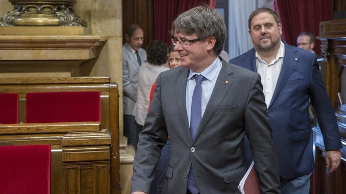 Carles Puigdemont y Oriol Junqueras