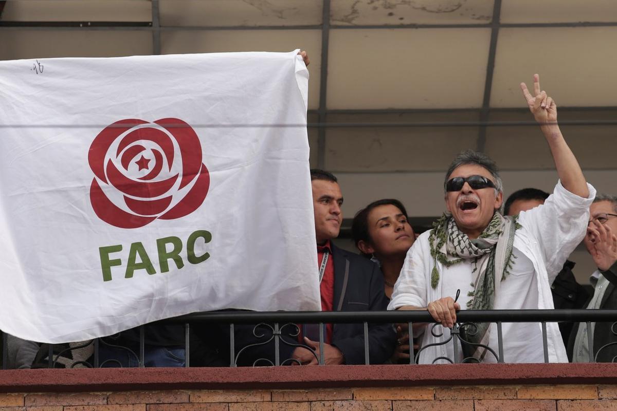 Former commander of Colombia s Marxist Revolutionary Alternative Force of the Common  FARC  Jesus Santrich greets people from the balcony of FARC s headquarters in Bogota  Colombia May 30  2019  REUTERS Andres Torres Galeano NO RESALES  NO ARCHIVES