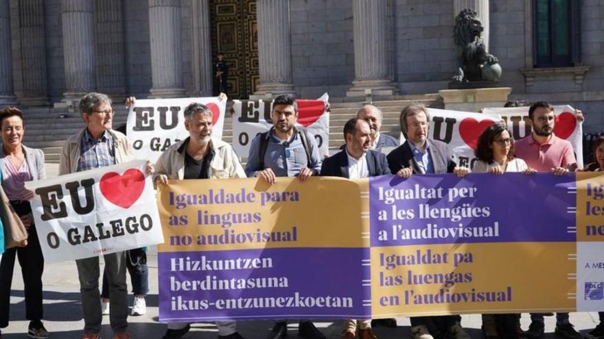 Miembros de A Mesa, en una concentración en Madrid