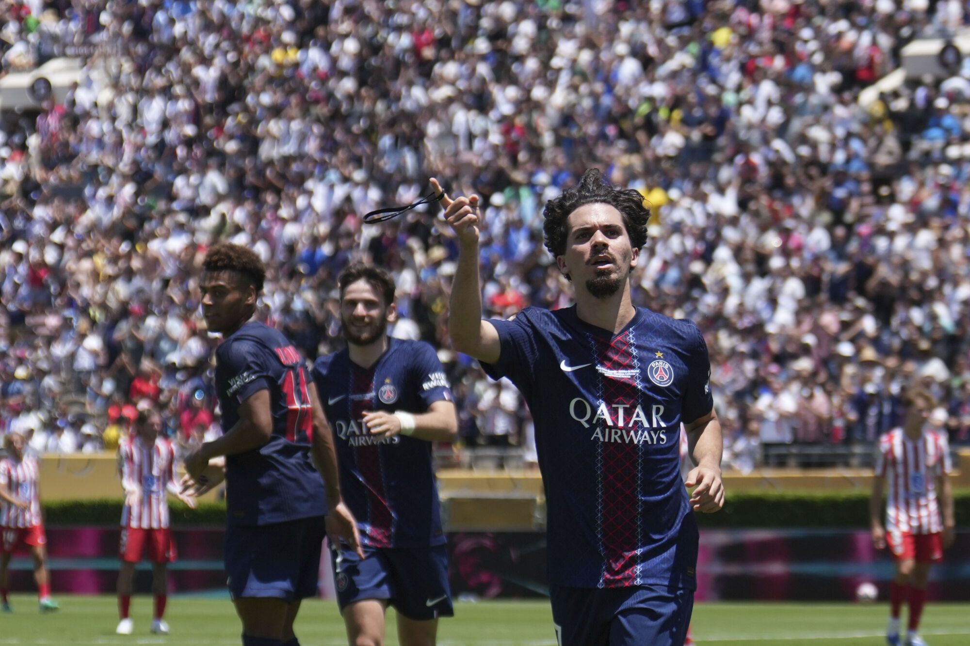 Paris Saint-Germain's Vitinha celebrates scoring his side's second goal during the Club World Cup group B soccer match between PSG and Atletico Madrid in Pasadena, Calif., Sunday, June 15, 2025. (AP Photo/Jae Hong) Associated Press/LaPresse. EDITORIAL USE ONLY/ONLY ITALY AND SPAIN