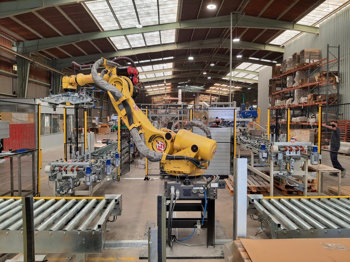 Un ejemplo del robot paletizador de altas producciones