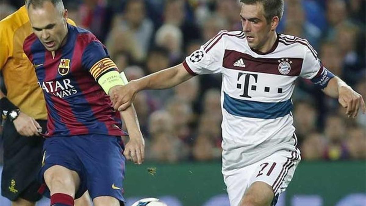 Iniesta y Lahm escenificaron la 'guerra de la posesión'