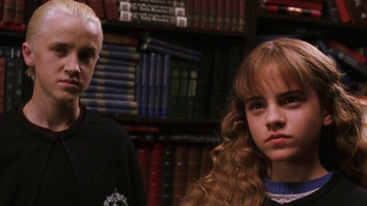 Tom Felton (Draco Malfoy) y Emma Watson (Hermione) en 'Harry Potter'
