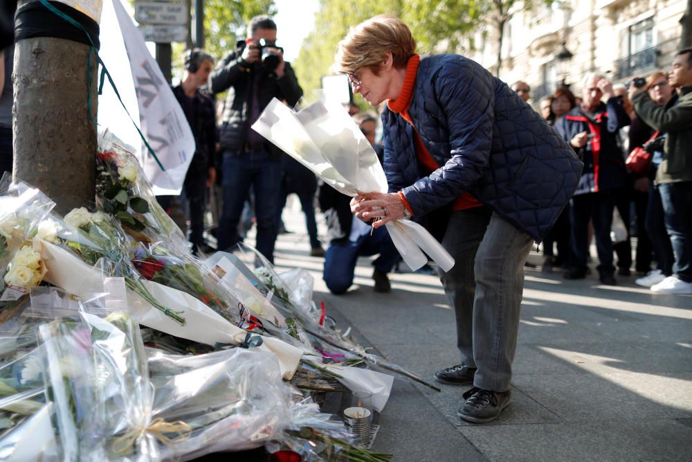 Francia rinde homenaje al policía asesinado en los Campos Elíseos