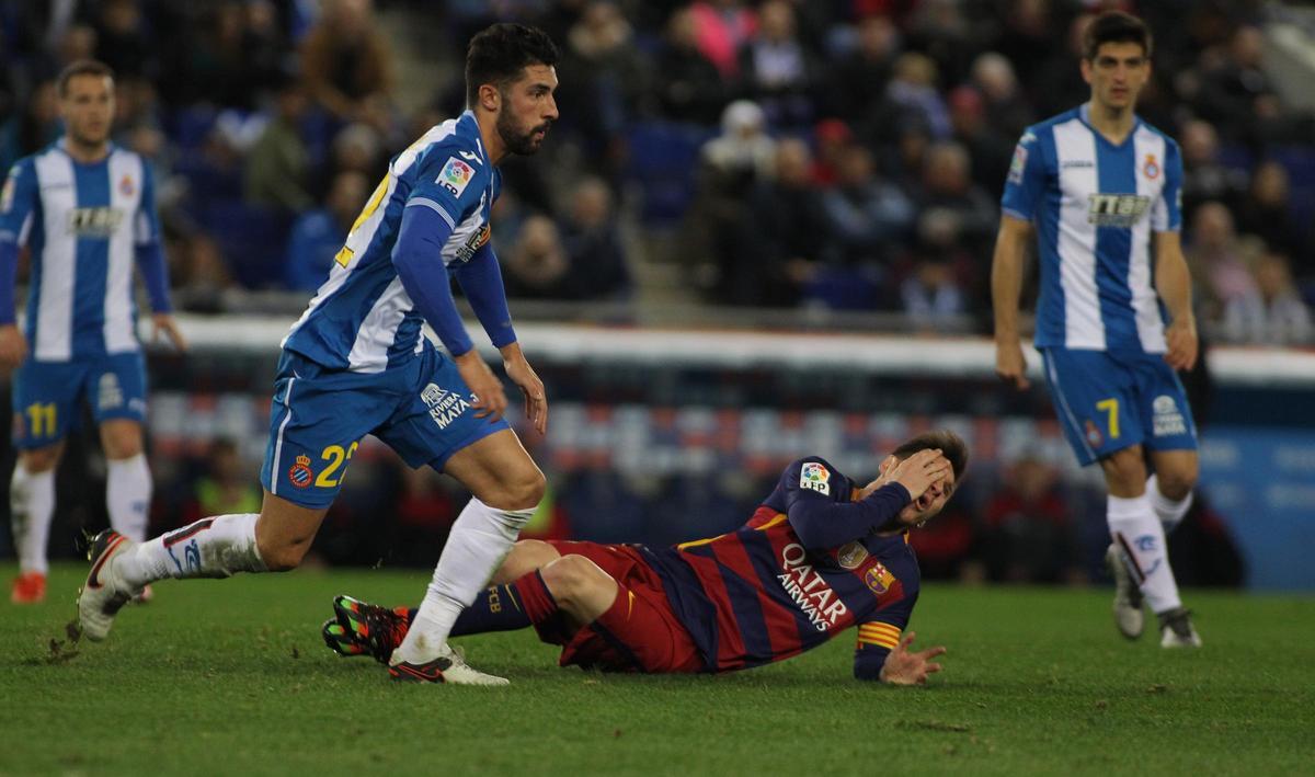 Álvaro González y Leo Messi, en sus respectivas etapas en Espanyol y Barça