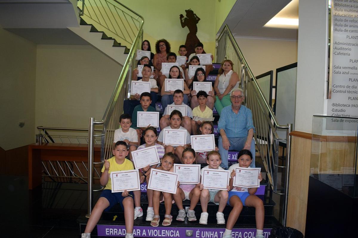 El acto de entrega de diplomas en el Auditorio Municipal de Valga.