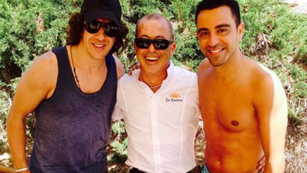 Xavi junto a Puyol en Ibiza