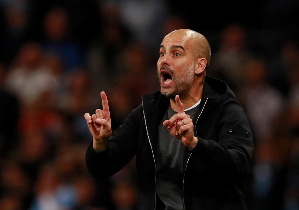 Soccer Football - Champions League - Manchester City vs S.S.C. Napoli - Etihad Stadium, Manchester, Britain - October 17, 2017 Manchester City manager Pep Guardiola Action Images via Reuters/Jason Cairnduff Soccer Football - Champions League - Manchester City vs S.S.C. Napoli - Etihad Stadium, Manchester, Britain - October 17, 2017 Manchester City manager Pep Guardiola Action Images via Reuters/Jason Cairnduff
