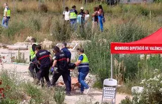 Levantamiento del cadáver del joven que desapareció el domingo en el río Turia
