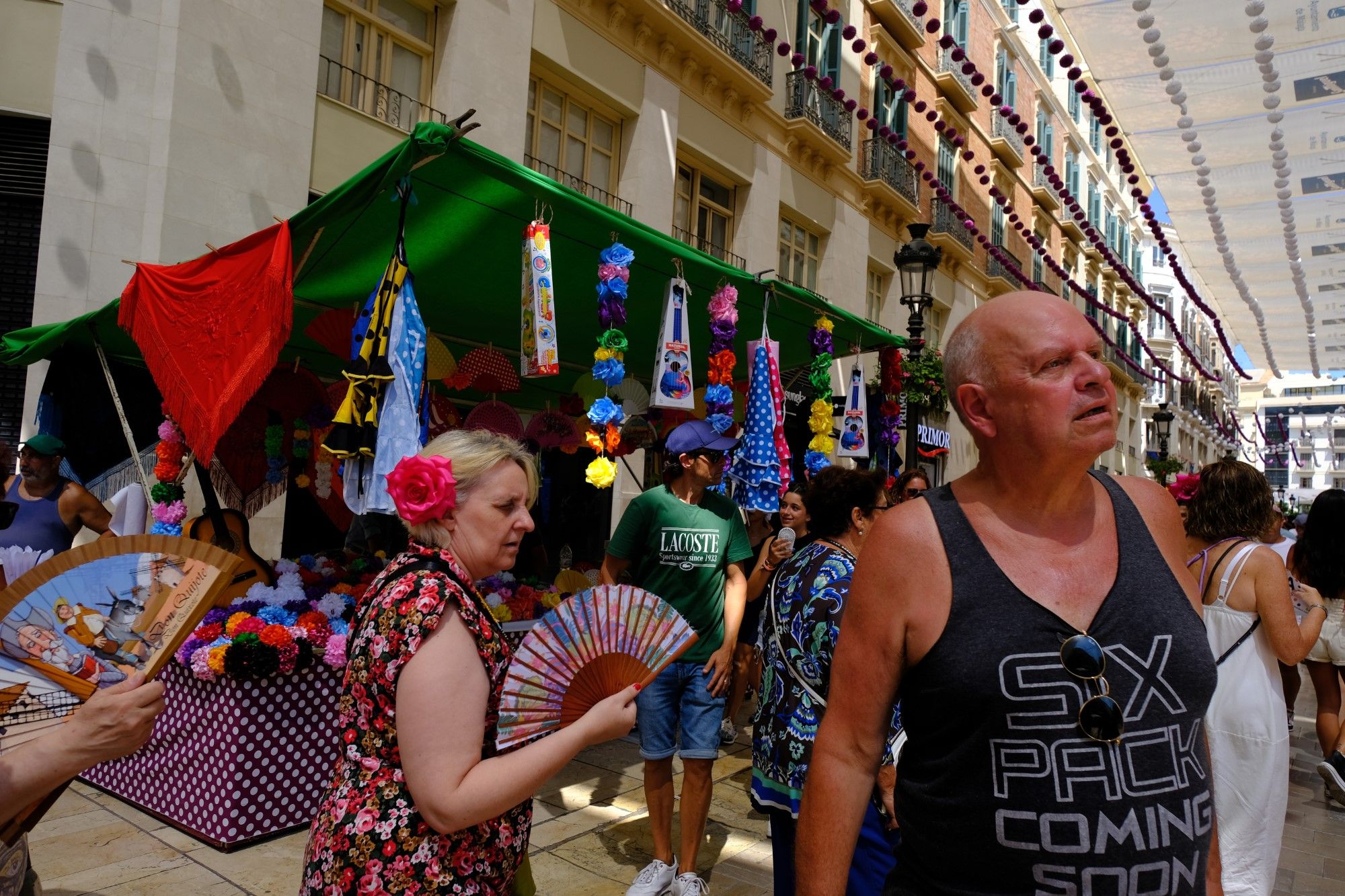 Así viven los extranjeros la Feria de Málaga 2023