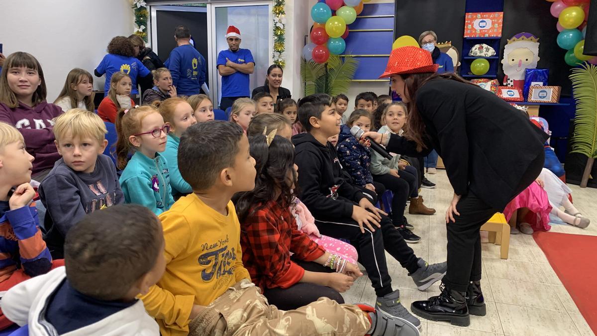 Los niños asistentes a la fiesta infantil de Reyes