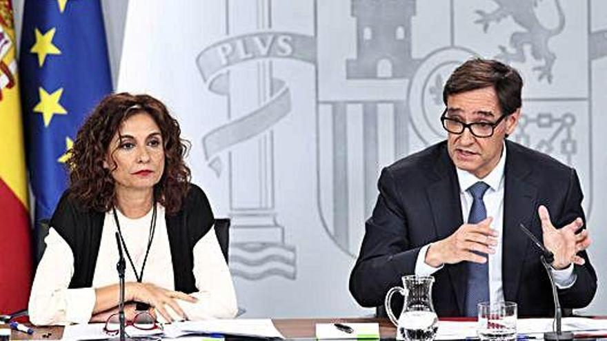 Els ministres Montero i Illa en una roda de premsa.