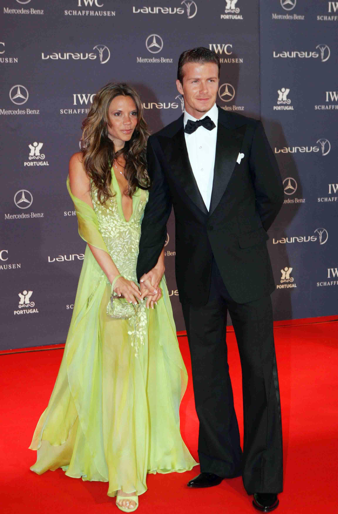 Victoria Beckham con vestido verde