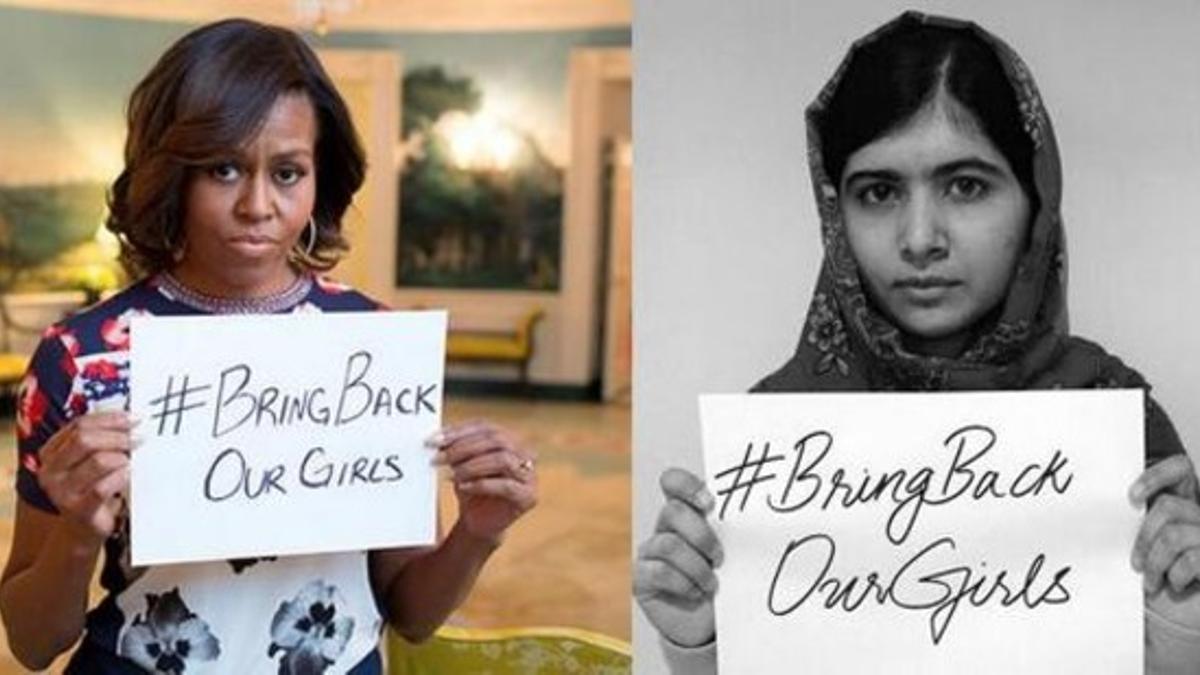Michelle Obama y Malala posan con un cartel con el lema de la campaña 'Bring Back Our Girls'.