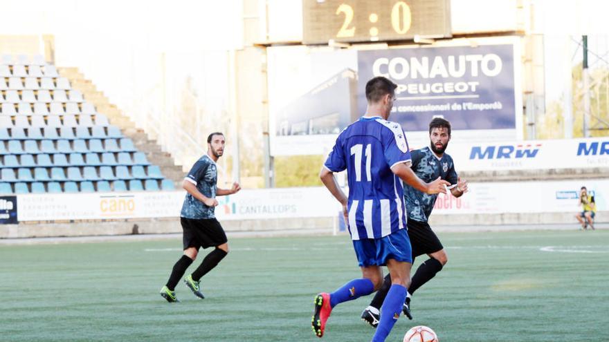 Una jugada del Figueres-Palamós de diumenge