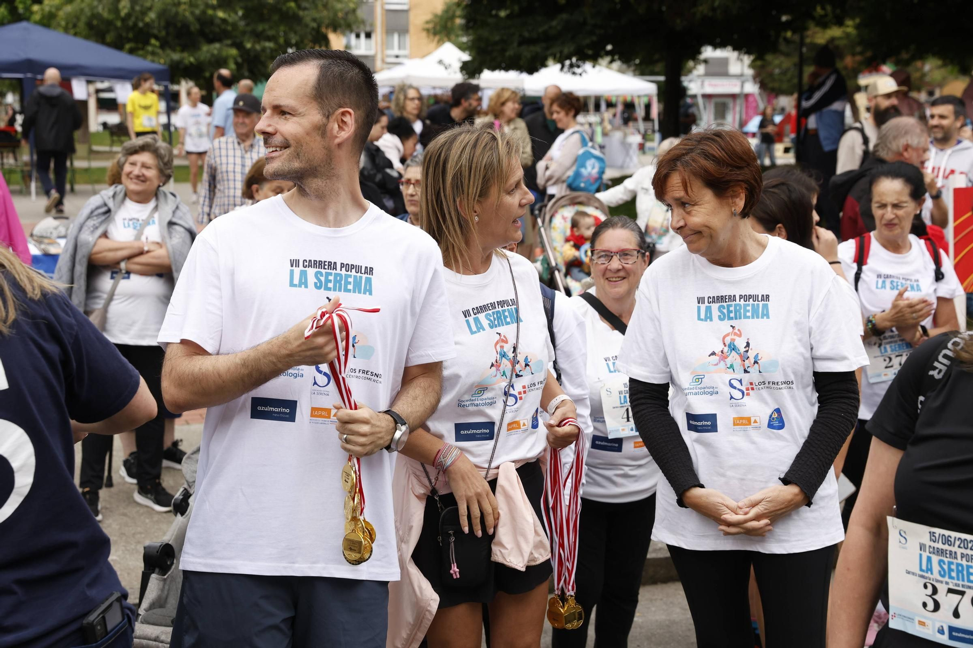 La carrera popular solidaria en El Llano, en Gijón, en imágenes