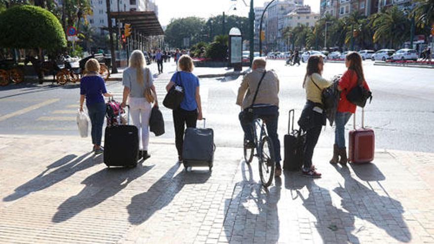 Un grupo de turistas en Málaga capital.