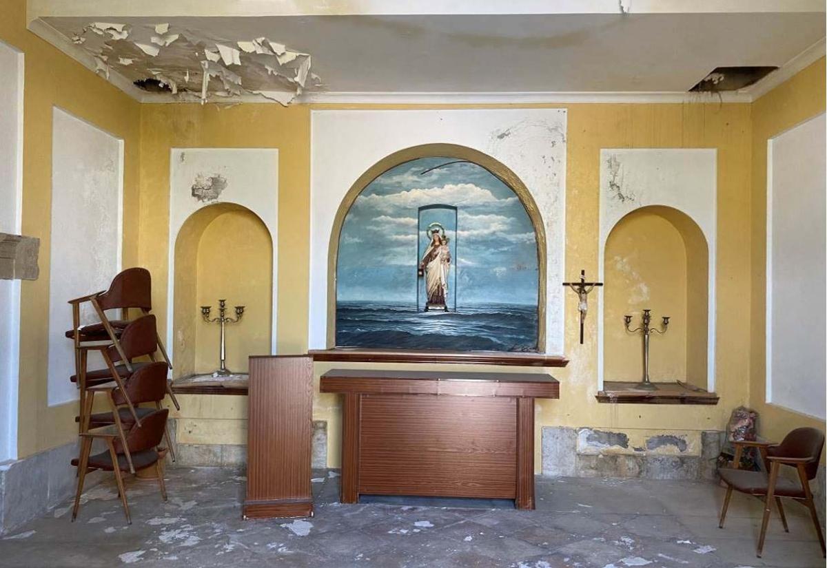 Una imagen del interior de la capilla del Puerto de Málaga.
