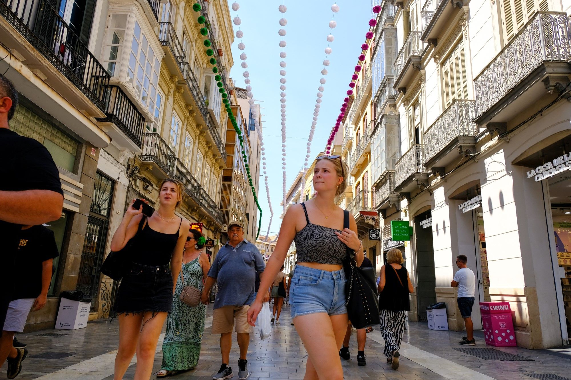 Así viven los extranjeros la Feria de Málaga 2023