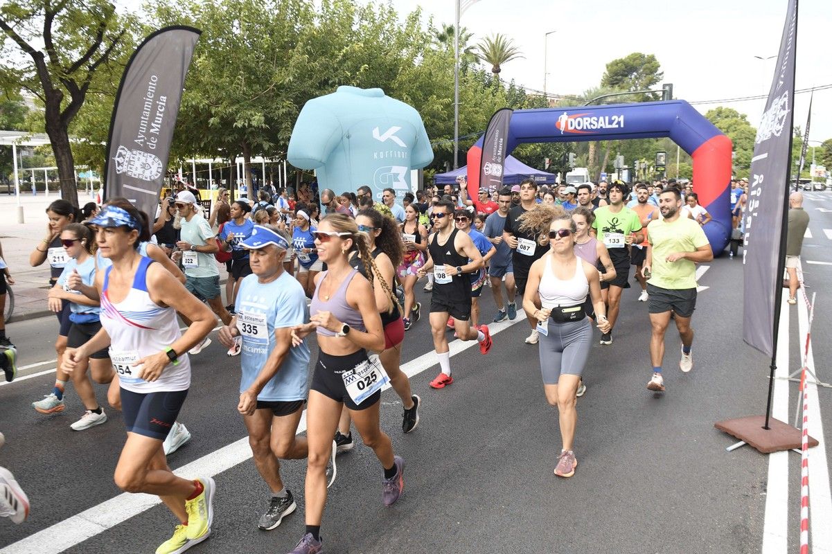 La carrera y marcha Solidaria Asteamur, en imágenes