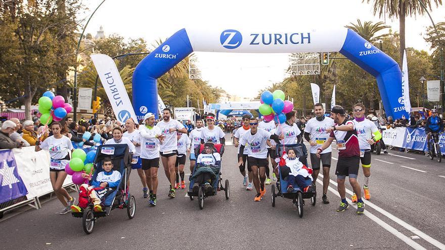 El equipo Zúrich AT, en plena acción durante la pasada Maratón de Málaga.