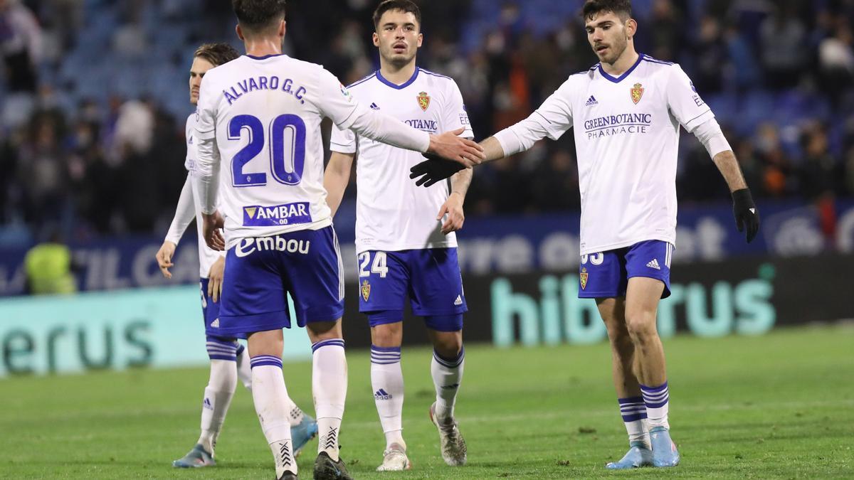 Álvaro Giménez, Lluís López y Puche, en el partido ante el Amorebieta.