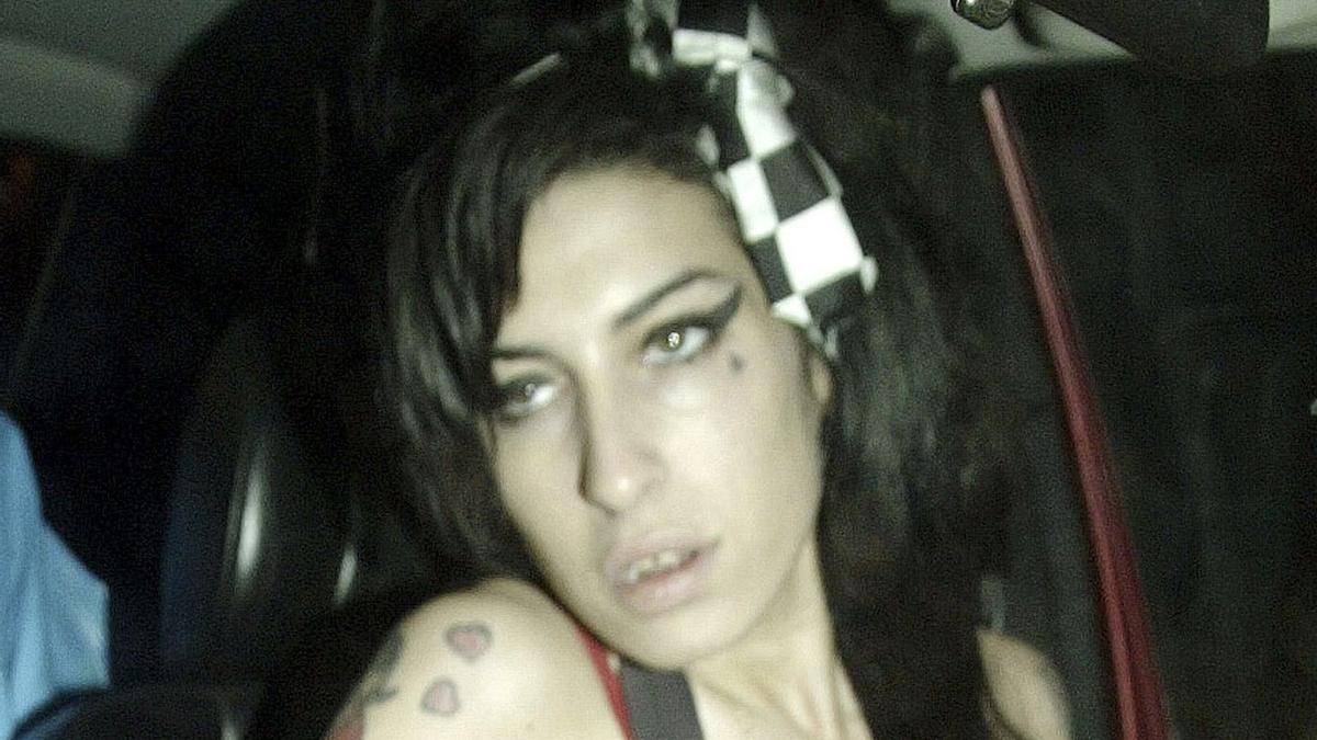 Amy Winehouse practica buceo junto a Bryan Adams