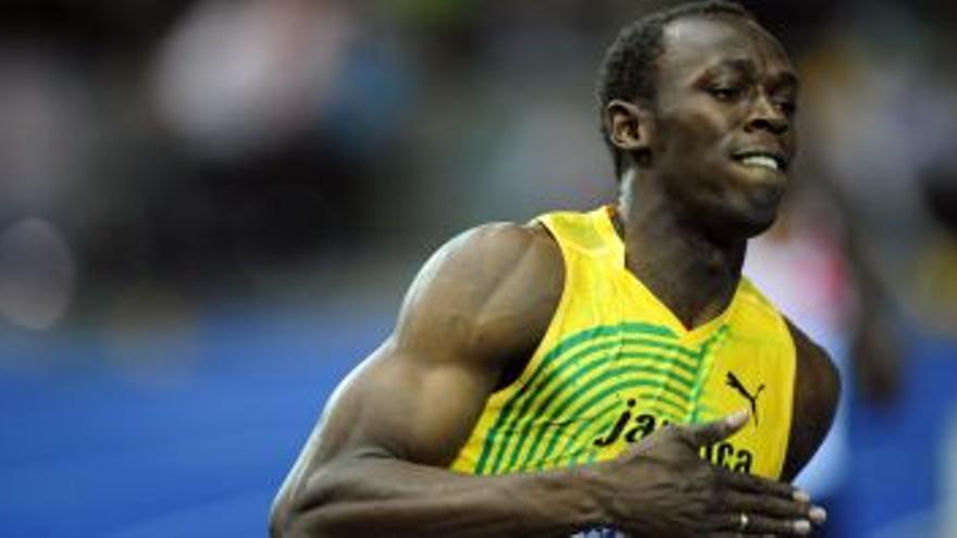 Bolt fulmina a Gay con nuevo récord mundial (9.58)