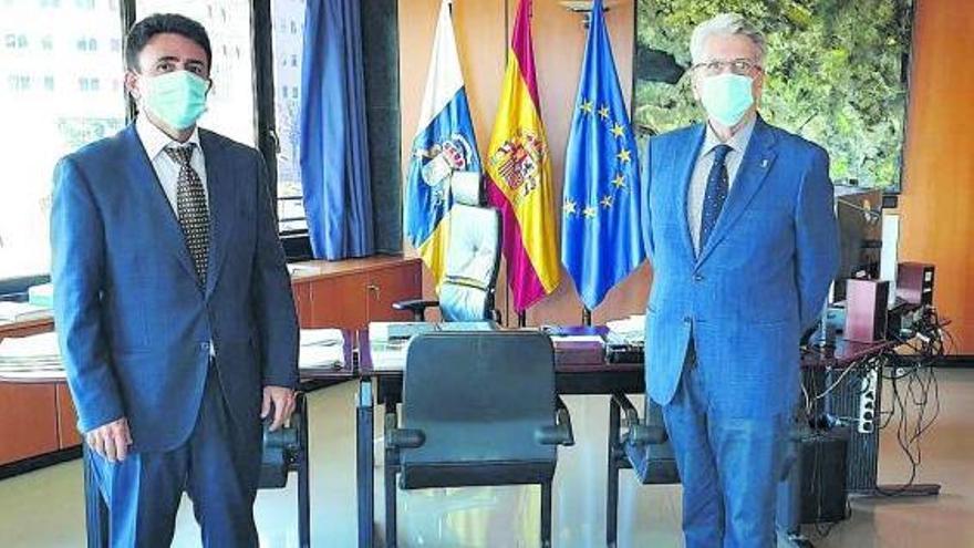 El nuevo presidente del Tribunal Superior de Justicia de Canarias (TSJC), Juan Luis Lorenzo Bragado, y el consejero de Justicia del Gobierno regional, Julio Pérez, mantuvieron ayer una reunión.