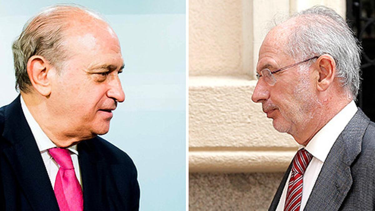 Jorge Fernández Díaz, ministro del Interior, y Rodrigo Rato, exvicepresidente del Gobierno y exministro de Economía