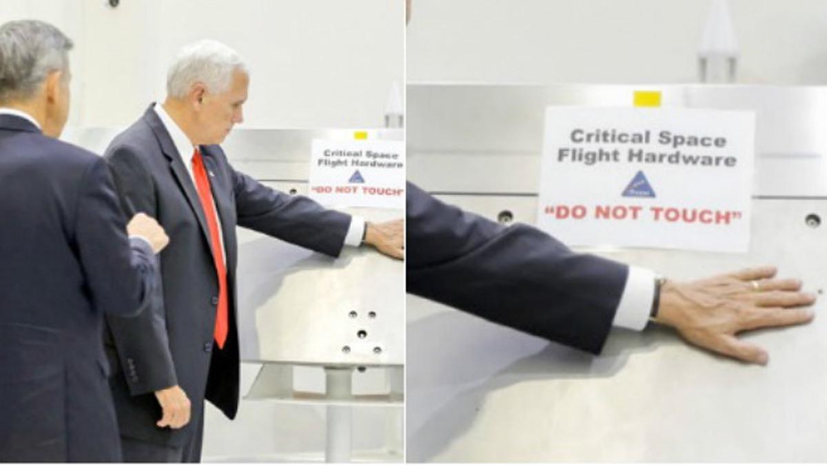 Mike Pence coloca su mano en un equipo de la NASA a pesar de la advertencia 'No tocar'.