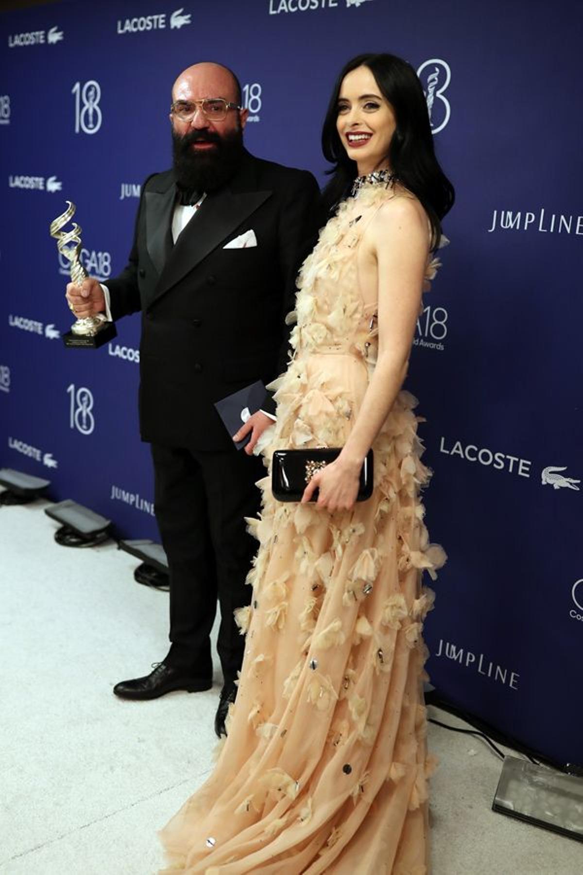 Paco Delgado y Krysten Ritter en los Costume Designers Guild Awards