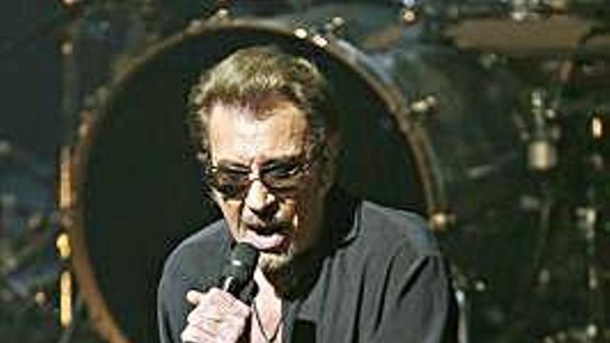 El fallecido cantante Johnny Hallyday, durante un concierto.